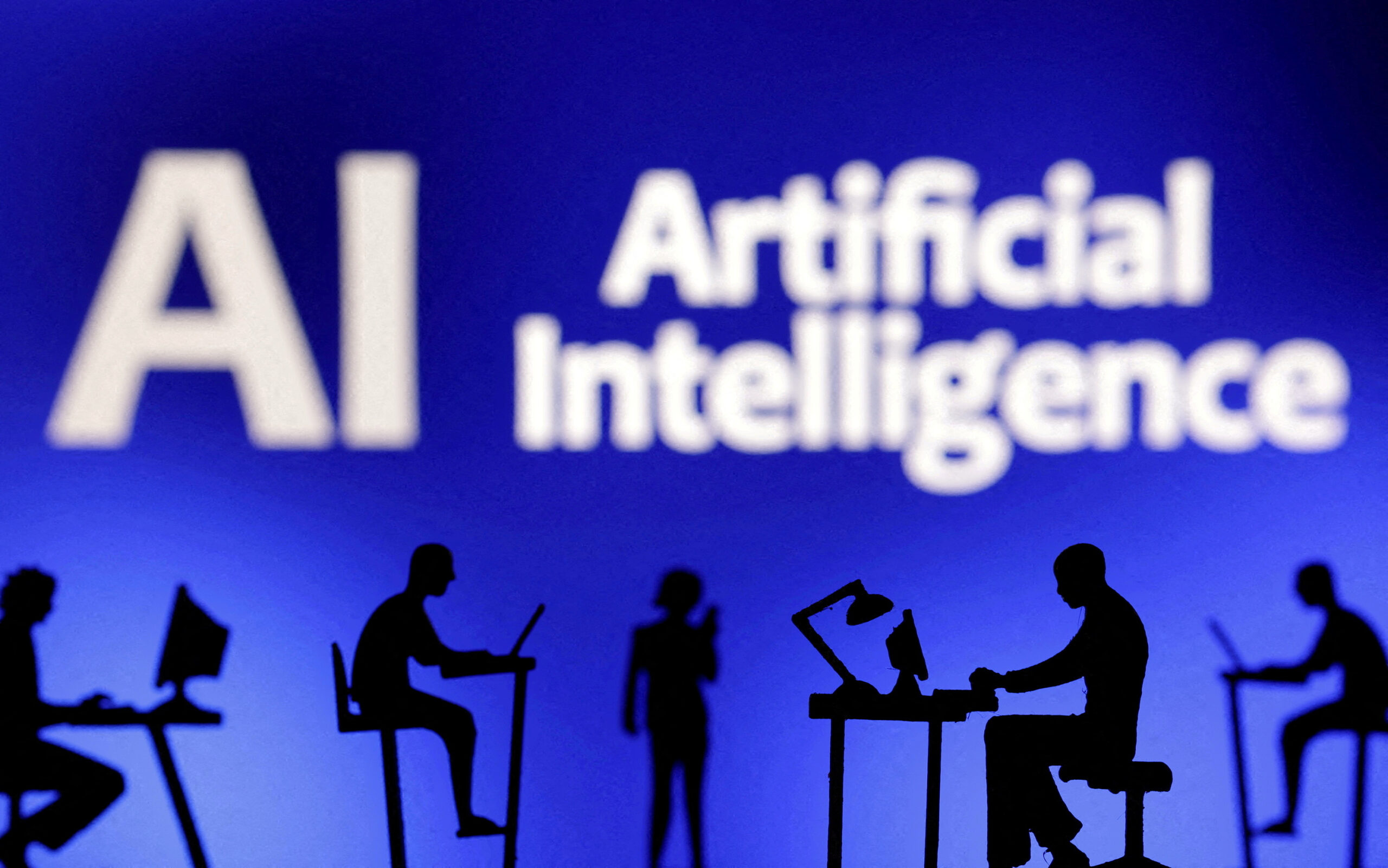 FILE PHOTO: Illustration shows words “Artificial Intelligence AI