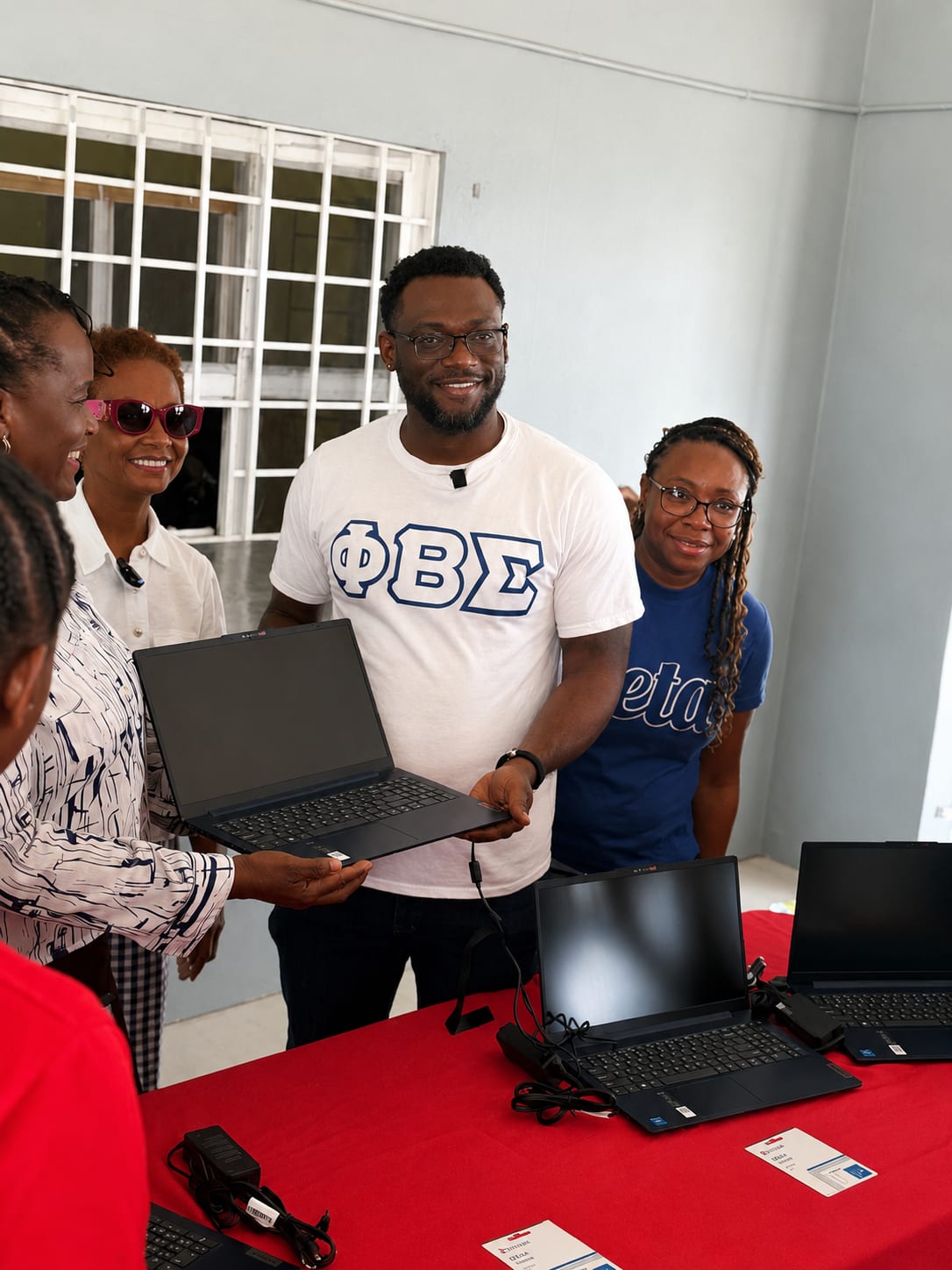 Phi Beta Sigma's Gamma Rho Sigma chapter donates laptops to Granville and Homestead Places of Safety in Hurricane Melissa Relief Effort