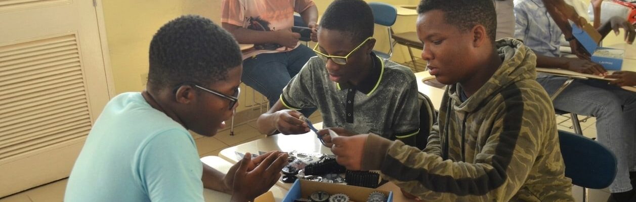 UTech, Ja STEM Summer Camp students working on robot 2