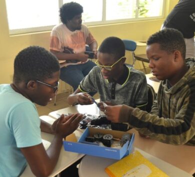 UTech, Ja STEM Summer Camp students working on robot 2