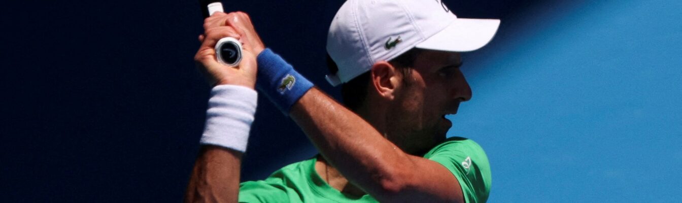 Serbian tennis player Novak Djokovic practices at Melbourne Park as questions remain over the legal battle regarding his visa to play in the Australian Open