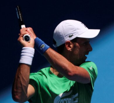Serbian tennis player Novak Djokovic practices at Melbourne Park as questions remain over the legal battle regarding his visa to play in the Australian Open
