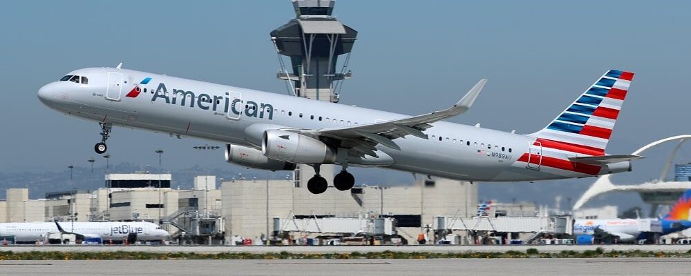 FILE PHOTO: An American Airlines Airbus A321 plane takes off from Los Angeles International airport