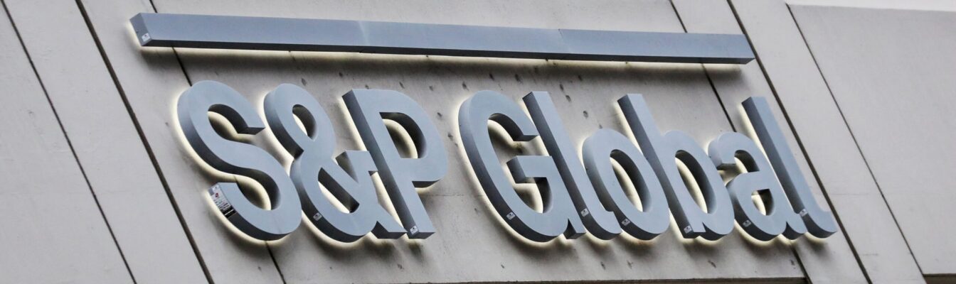 FILE PHOTO: The S&P Global logo is displayed on its offices in the financial district in New York