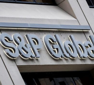 FILE PHOTO: The S&P Global logo is displayed on its offices in the financial district in New York