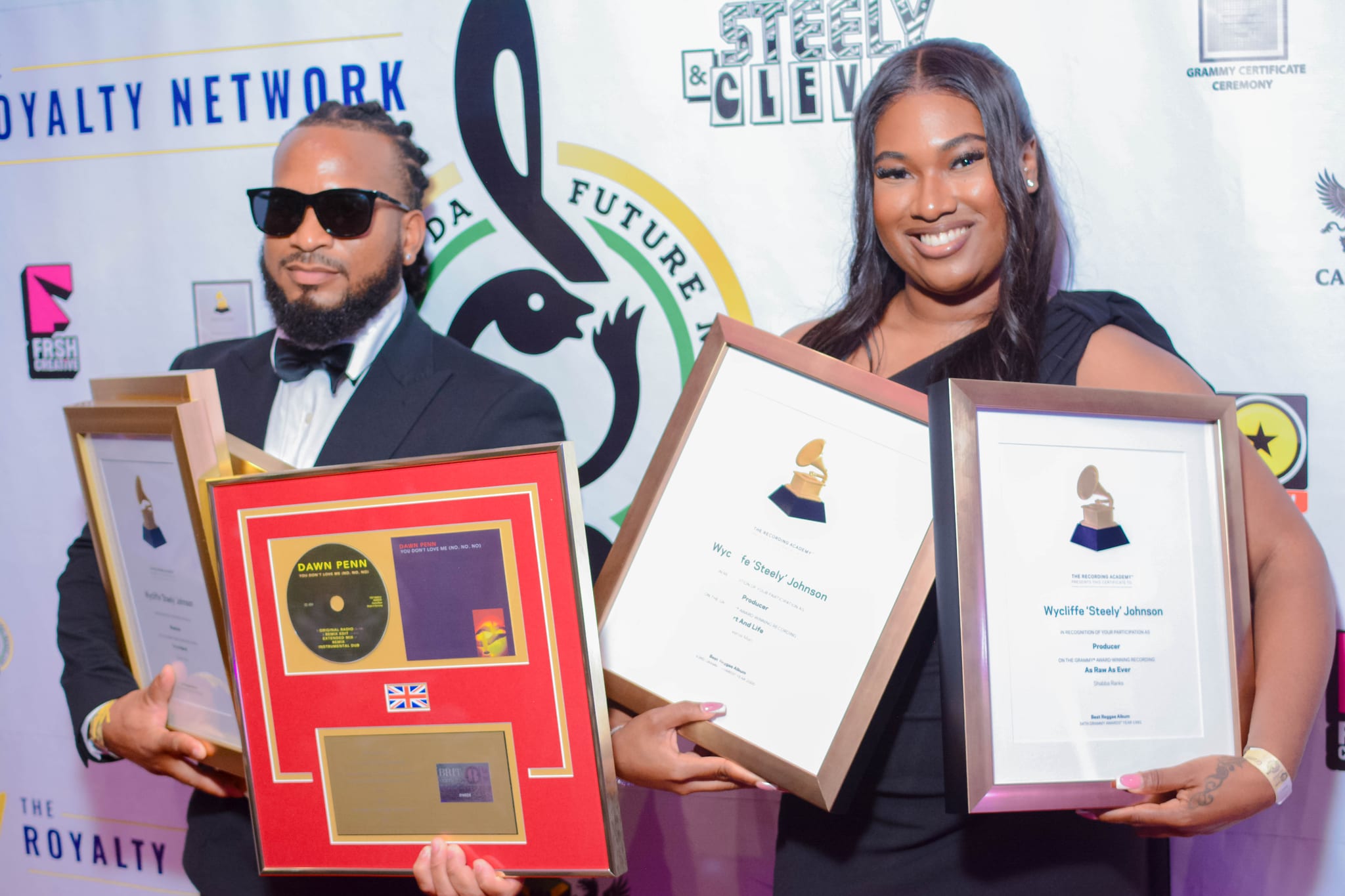 Shea and Shanice Johson - Collecting on behalf of their late father Wycliffe 'Steely' Johnson